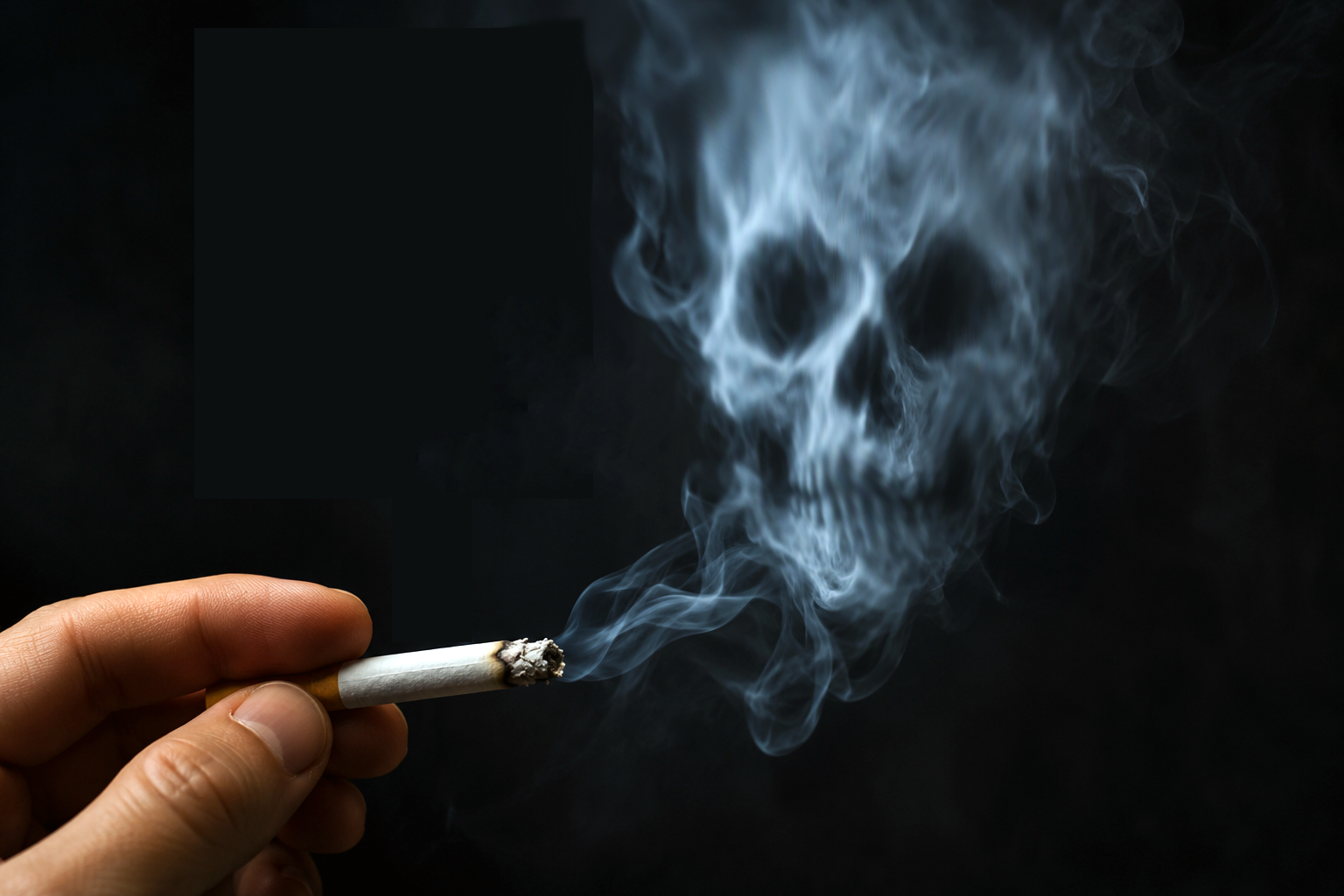 Fum d'una cigarreta que es transforma en una calavera